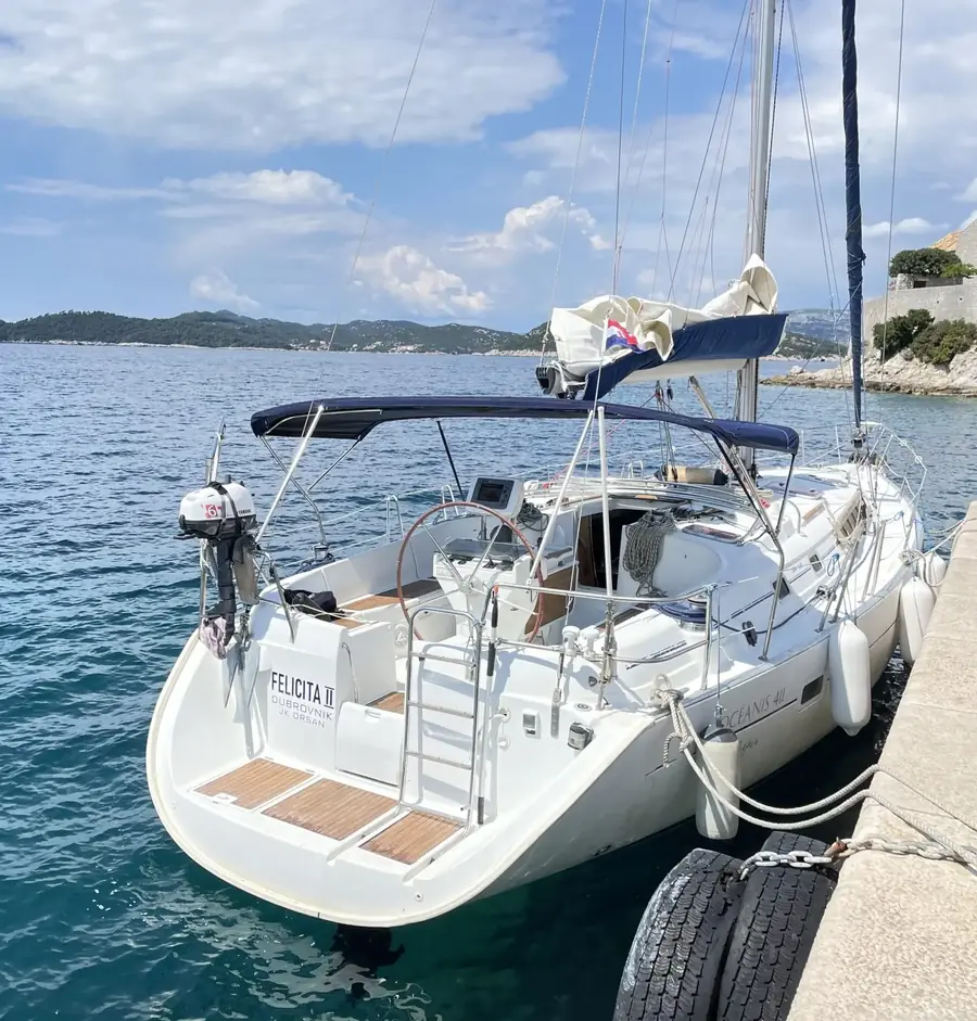 Stern and cockpit of the Beneteau Oceanis 411 moored at a quay